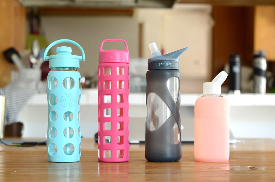 four runner up glass bottles