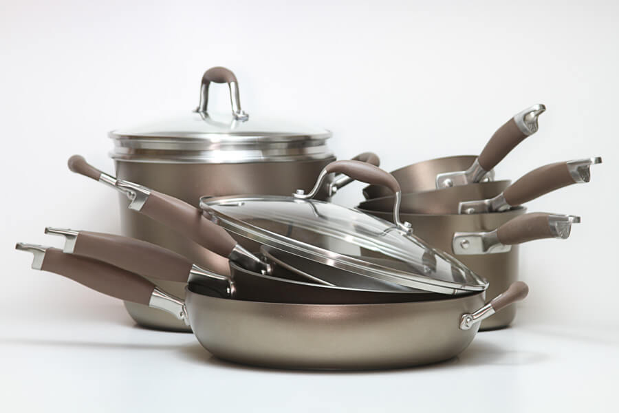 stacked set of Anolon cookware