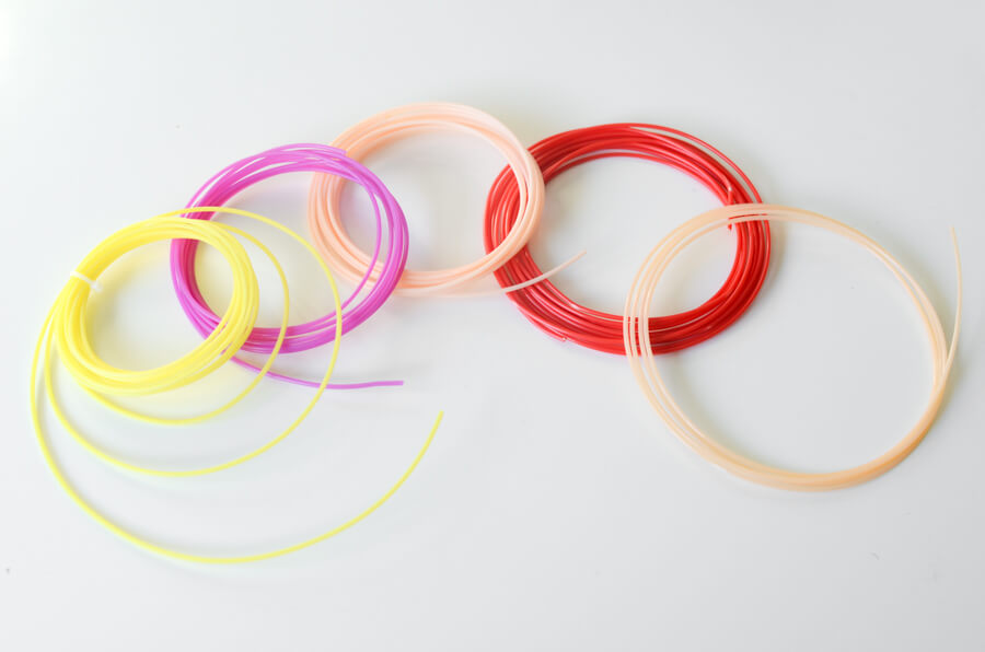 coils of different colored thermoplastic