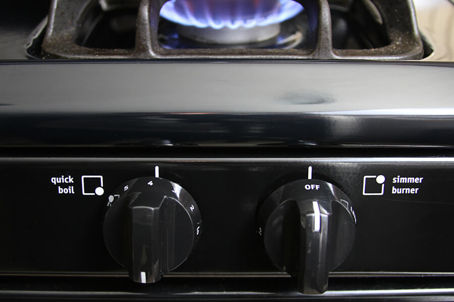 gas stove knob turned to medium heat