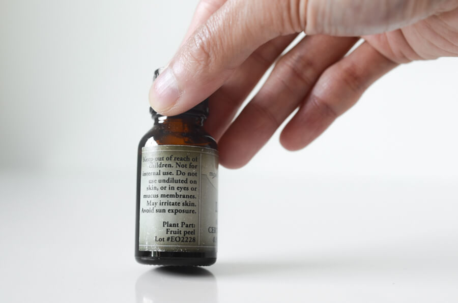 reading instructions on a bottle