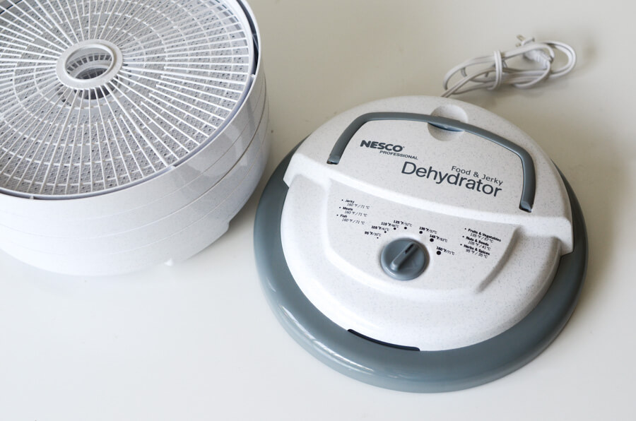 Nesco machine with trays