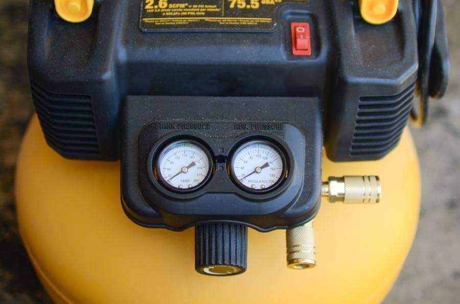 closeup of Dewalt's gauges and valves