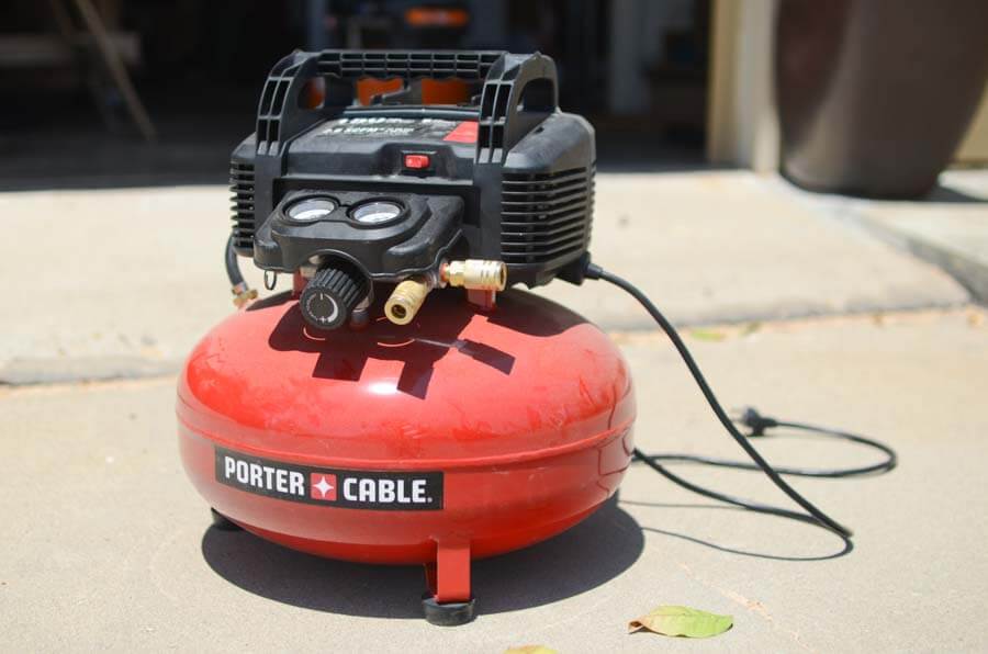 red Porter Cable dual hose compressor