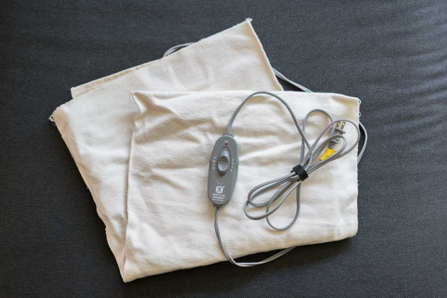 Thermophore electric heating pad