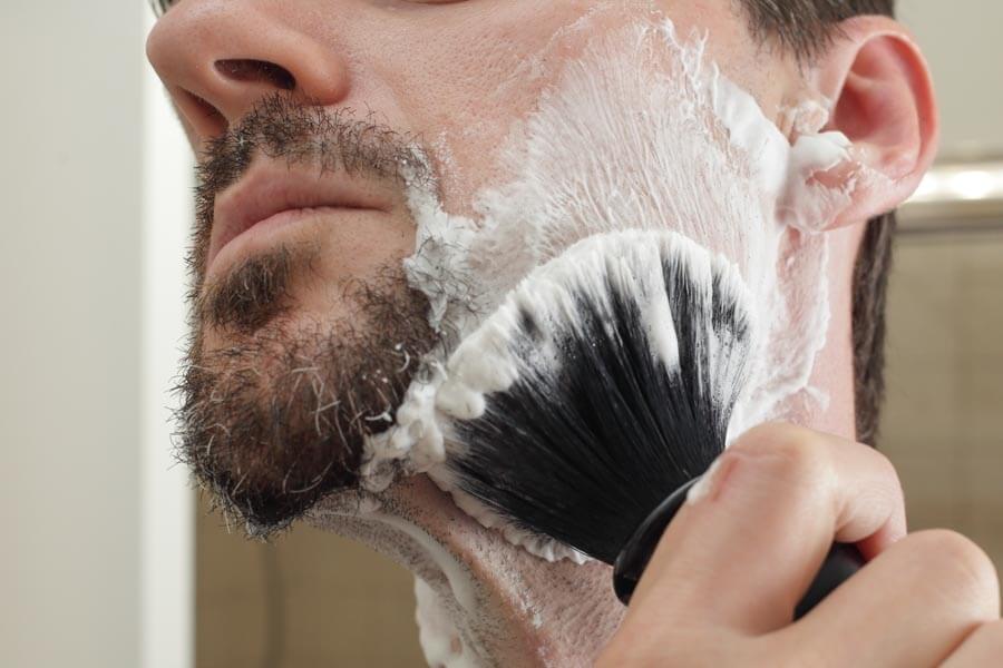 lathering soap on the face