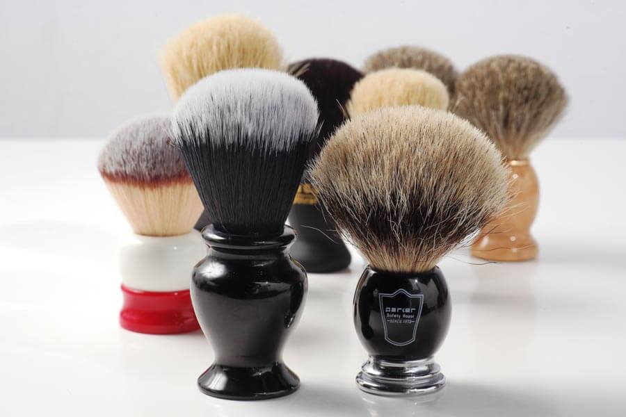 a pair of shaving brushes
