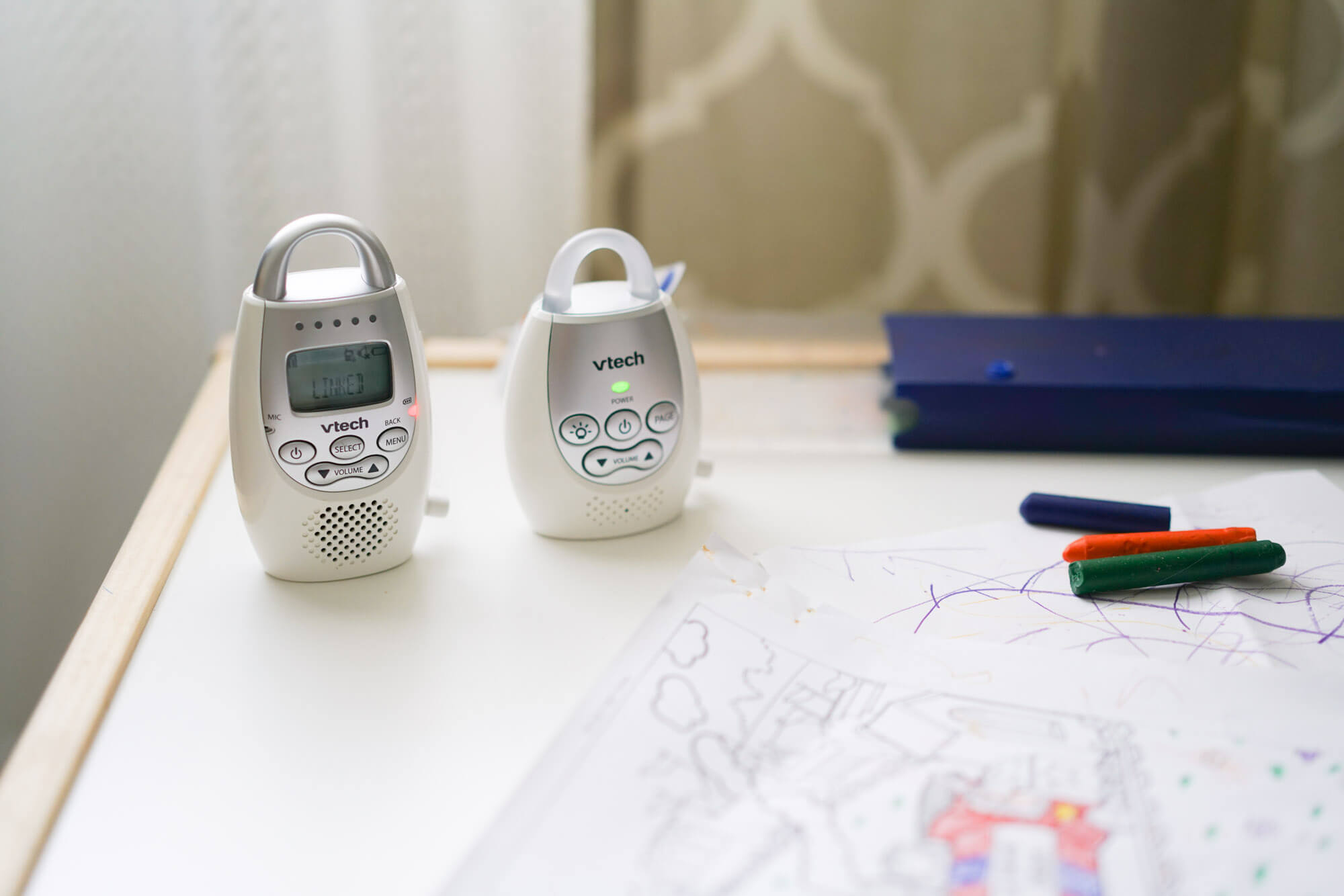 Vtech - DM221 on a child's coloring table