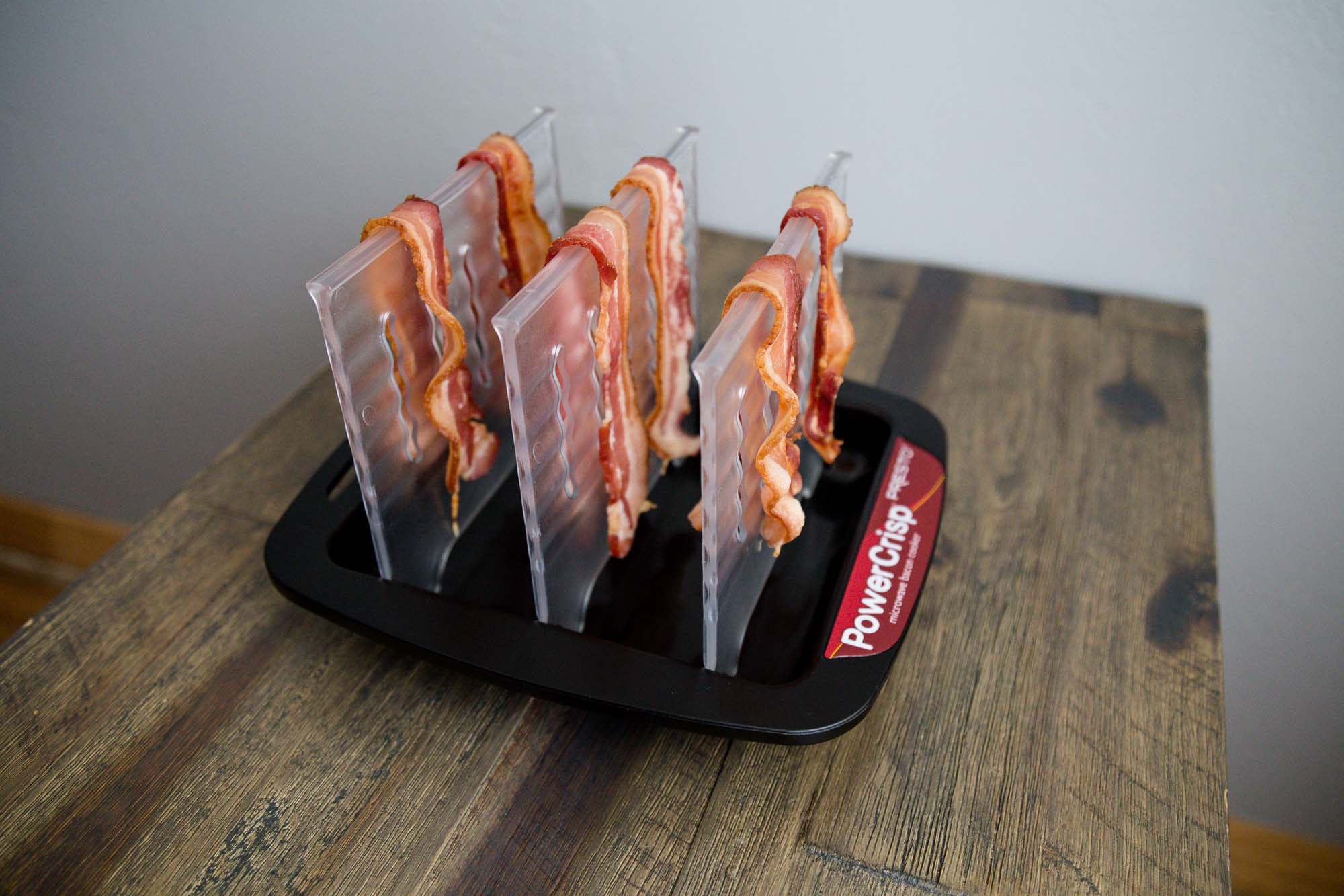 Presto Power Crisp draped with bacon slices