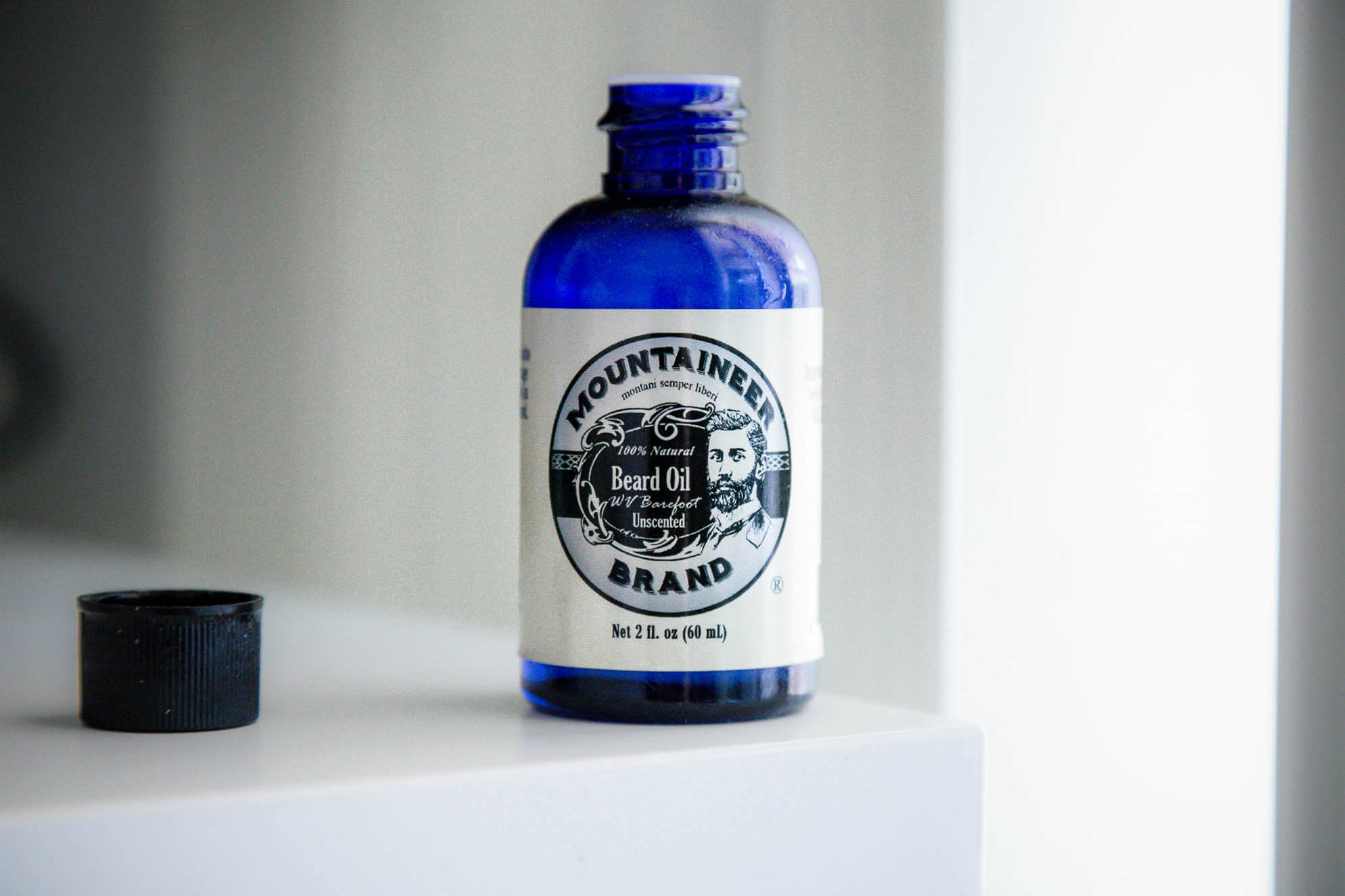 Mountaineer Brand in a bright blue bottle