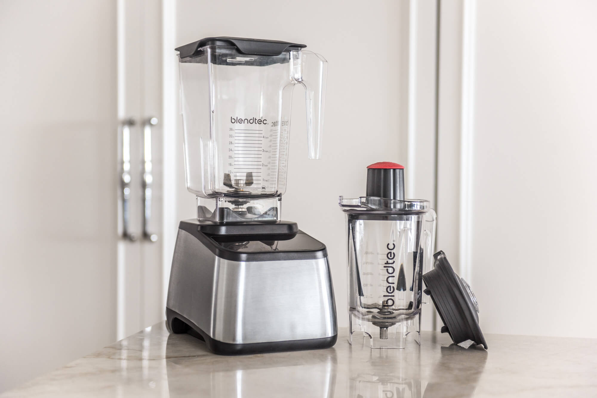 Blendtec on table with white background. 
