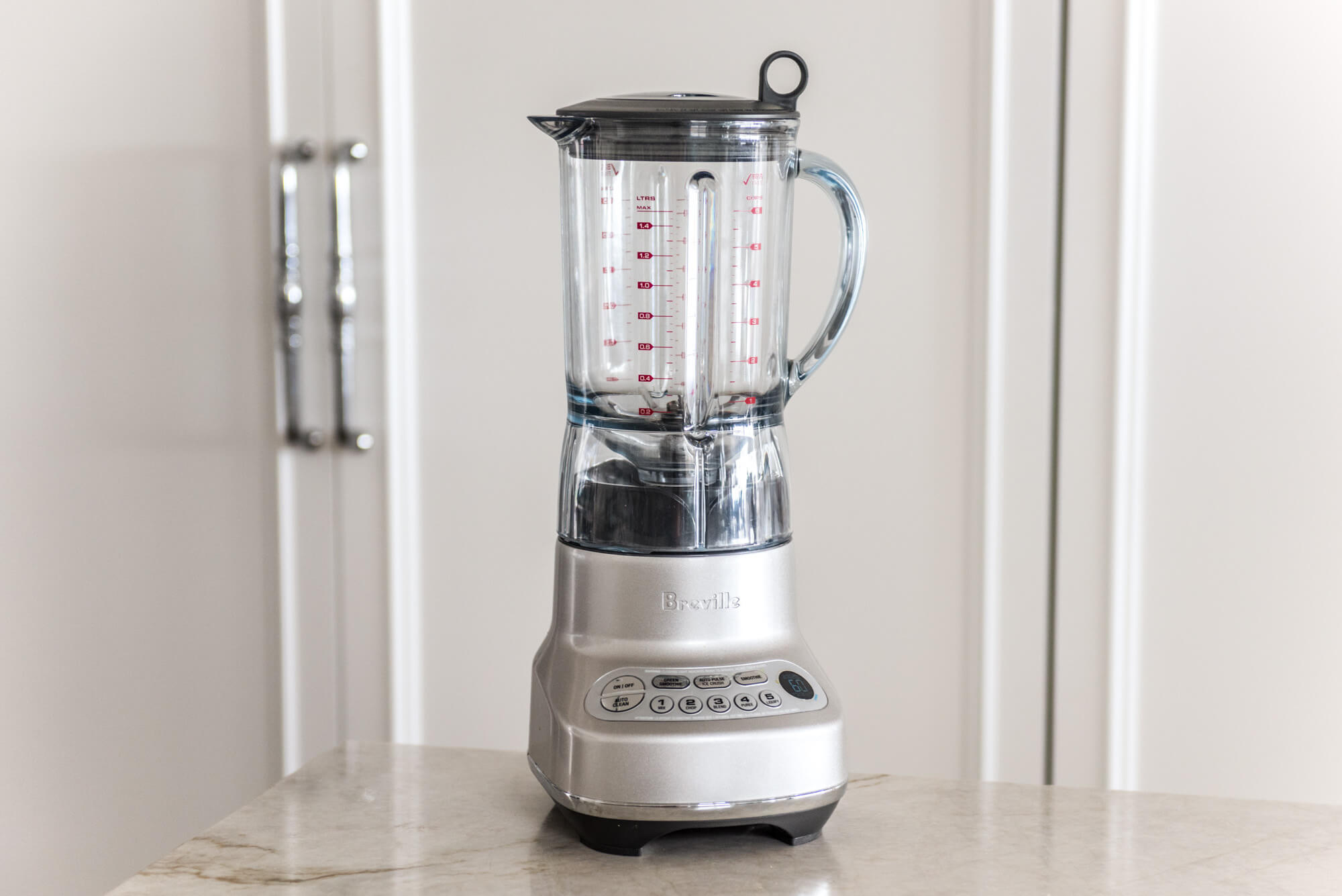 Breville on table with white background.