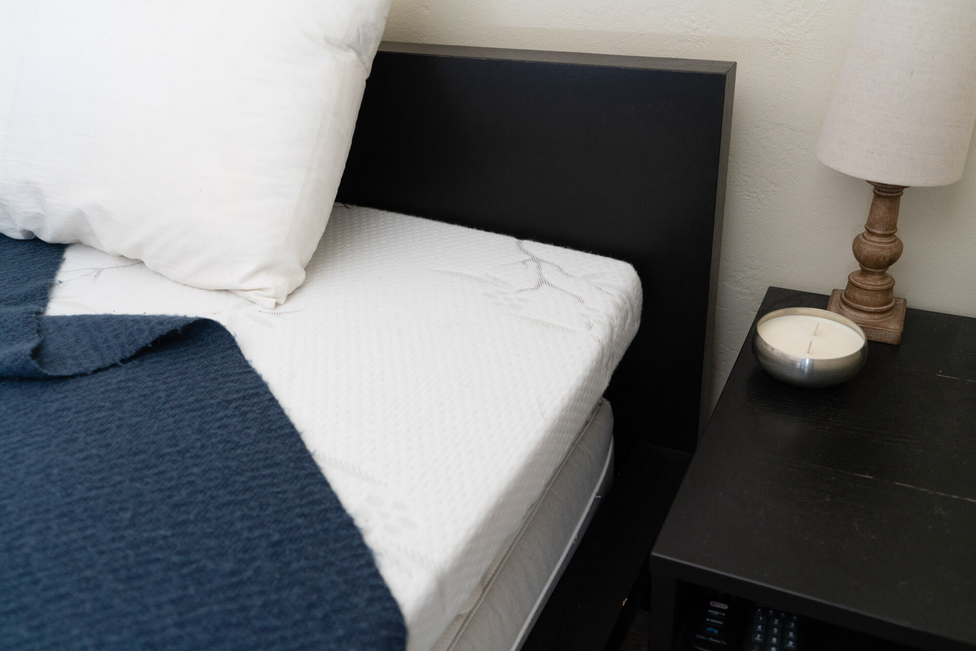 Dreamfoam Bedding mattress topper installed on bed