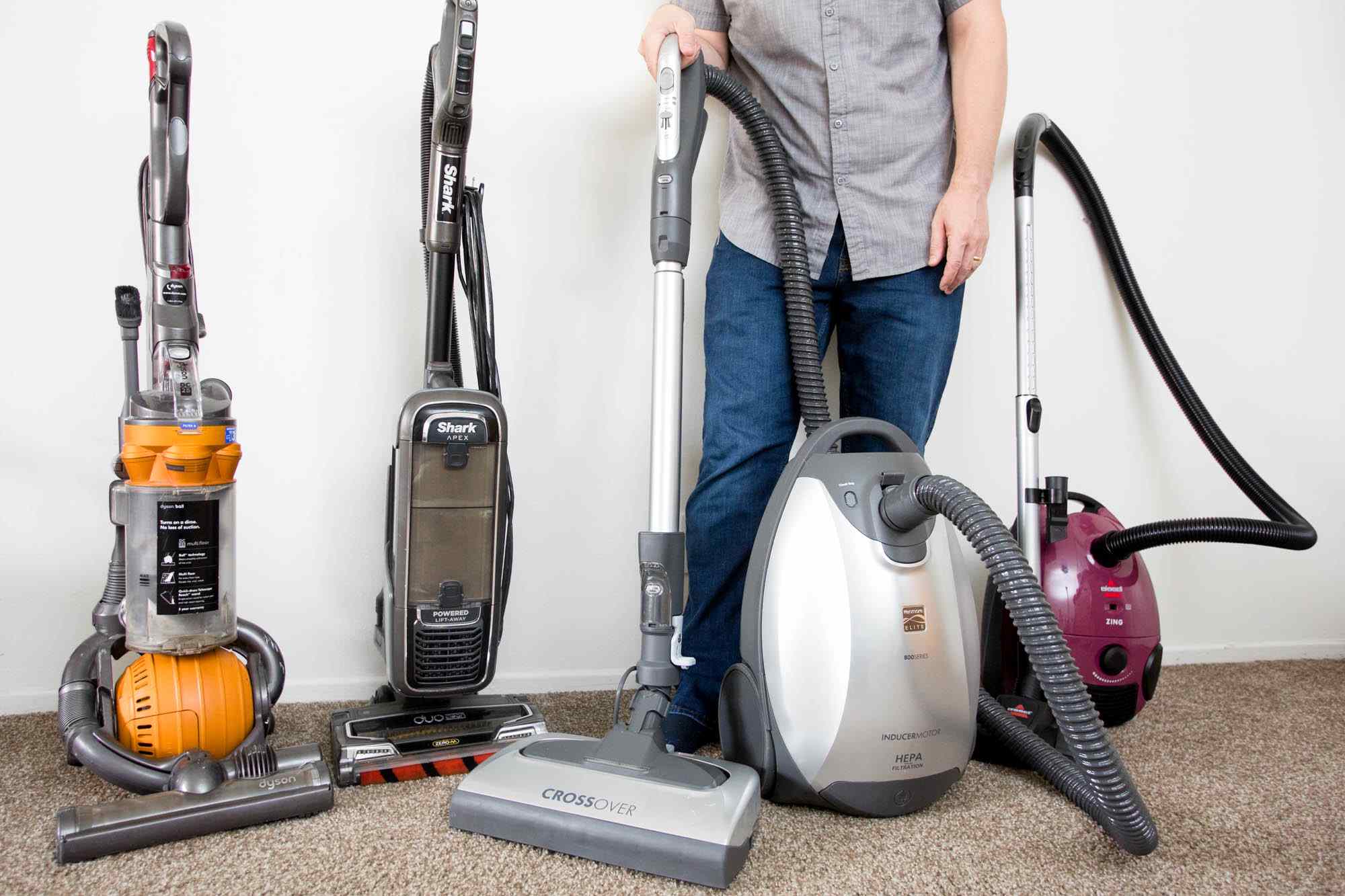 Canister vacuums vs. upright designs
