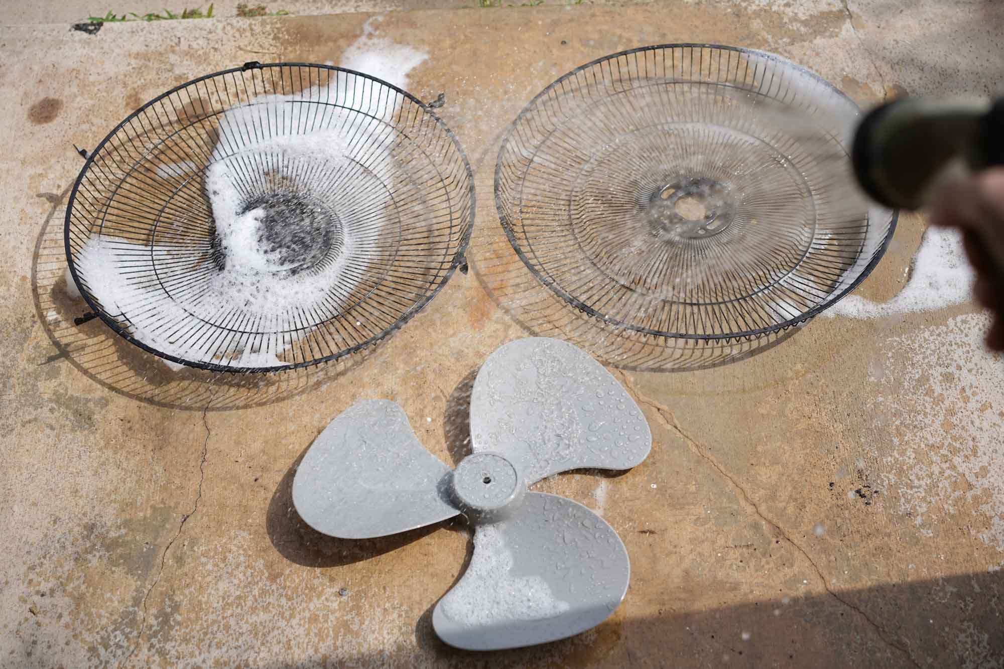 rinsing off fan parts