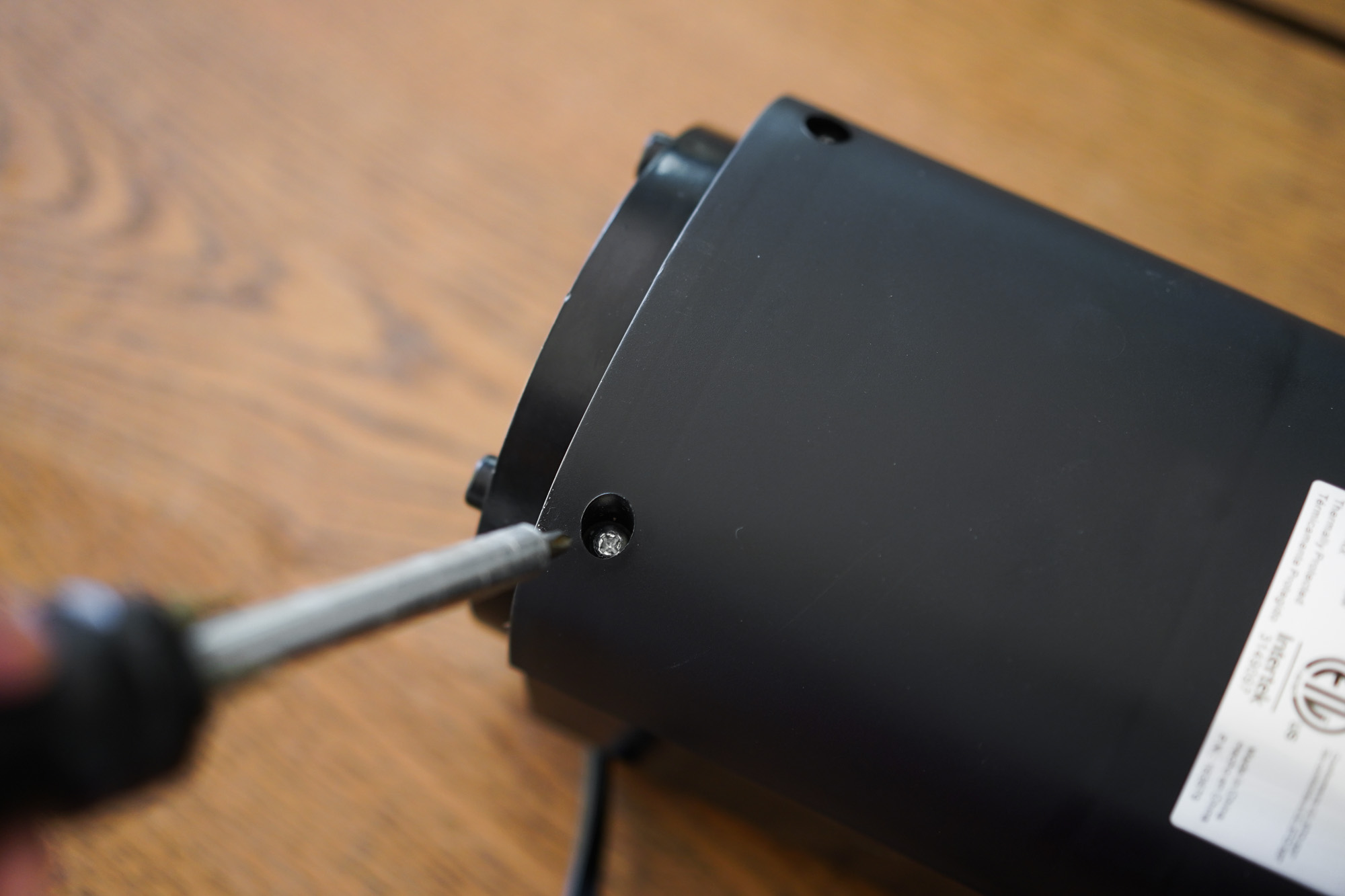 unscrewing the casing