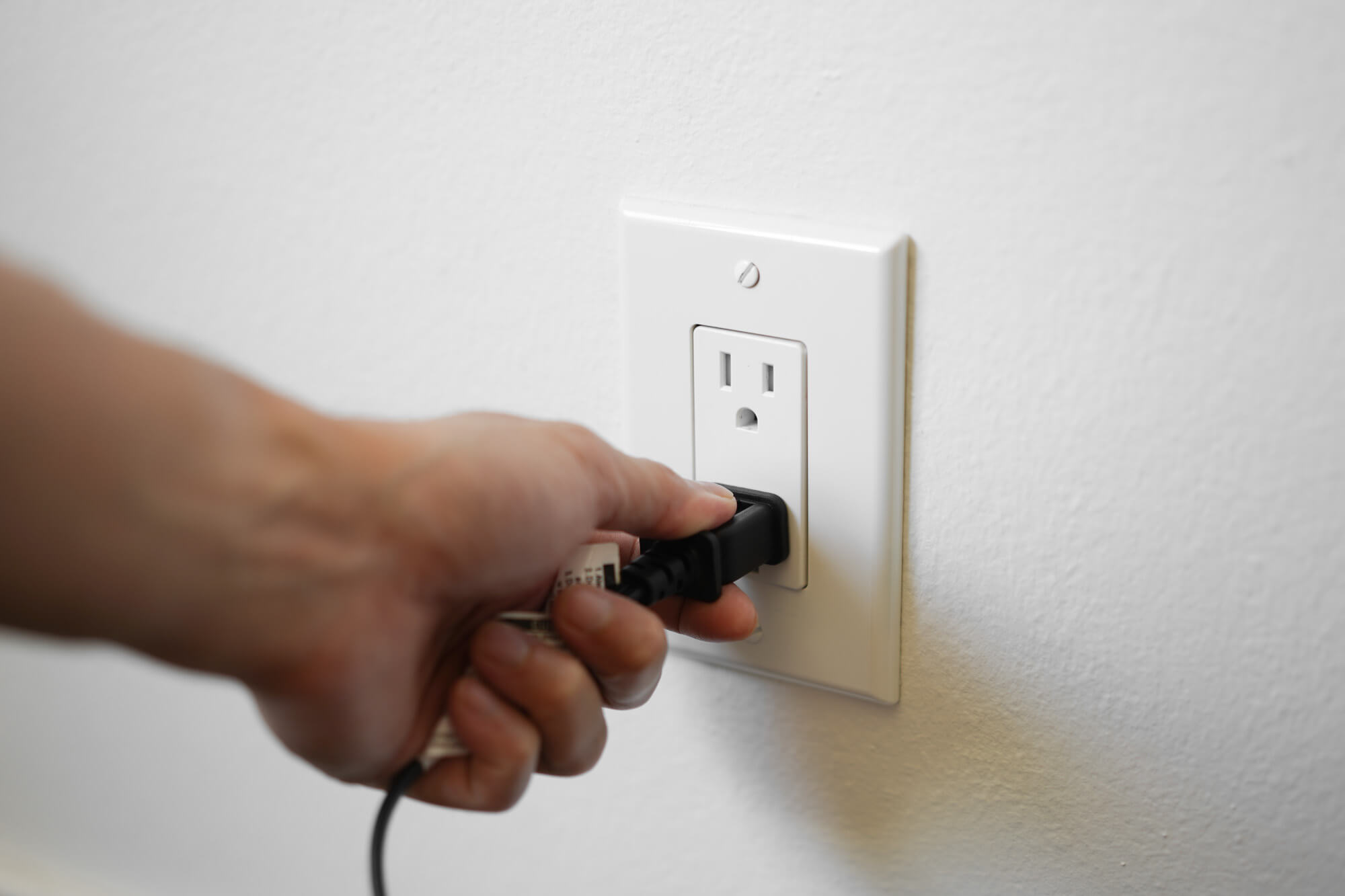 unplugging a fan's power cord