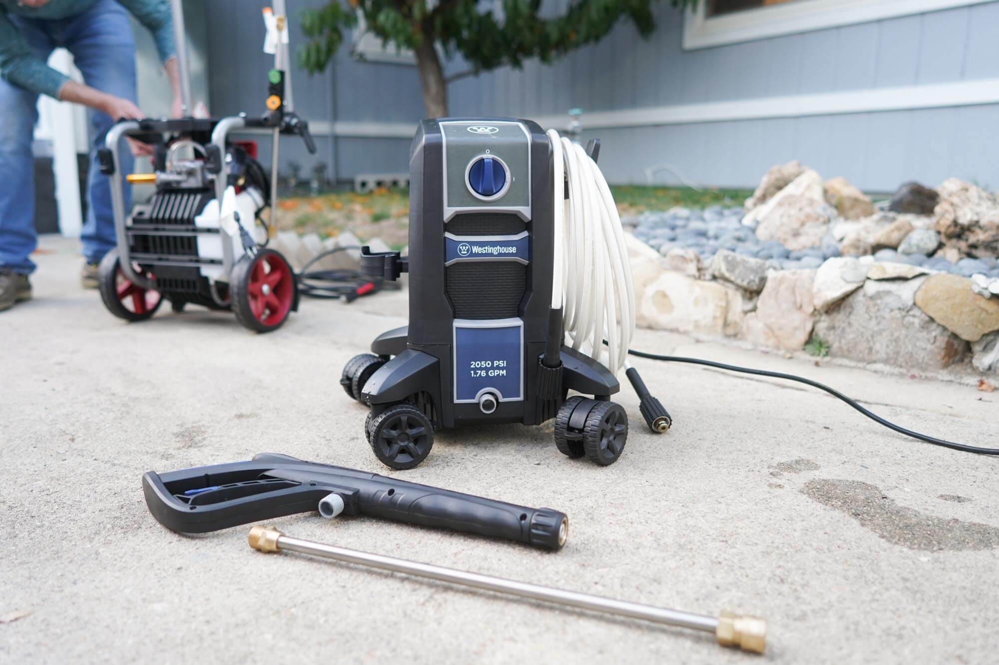 Westinghouse blue pressure washer on concrete