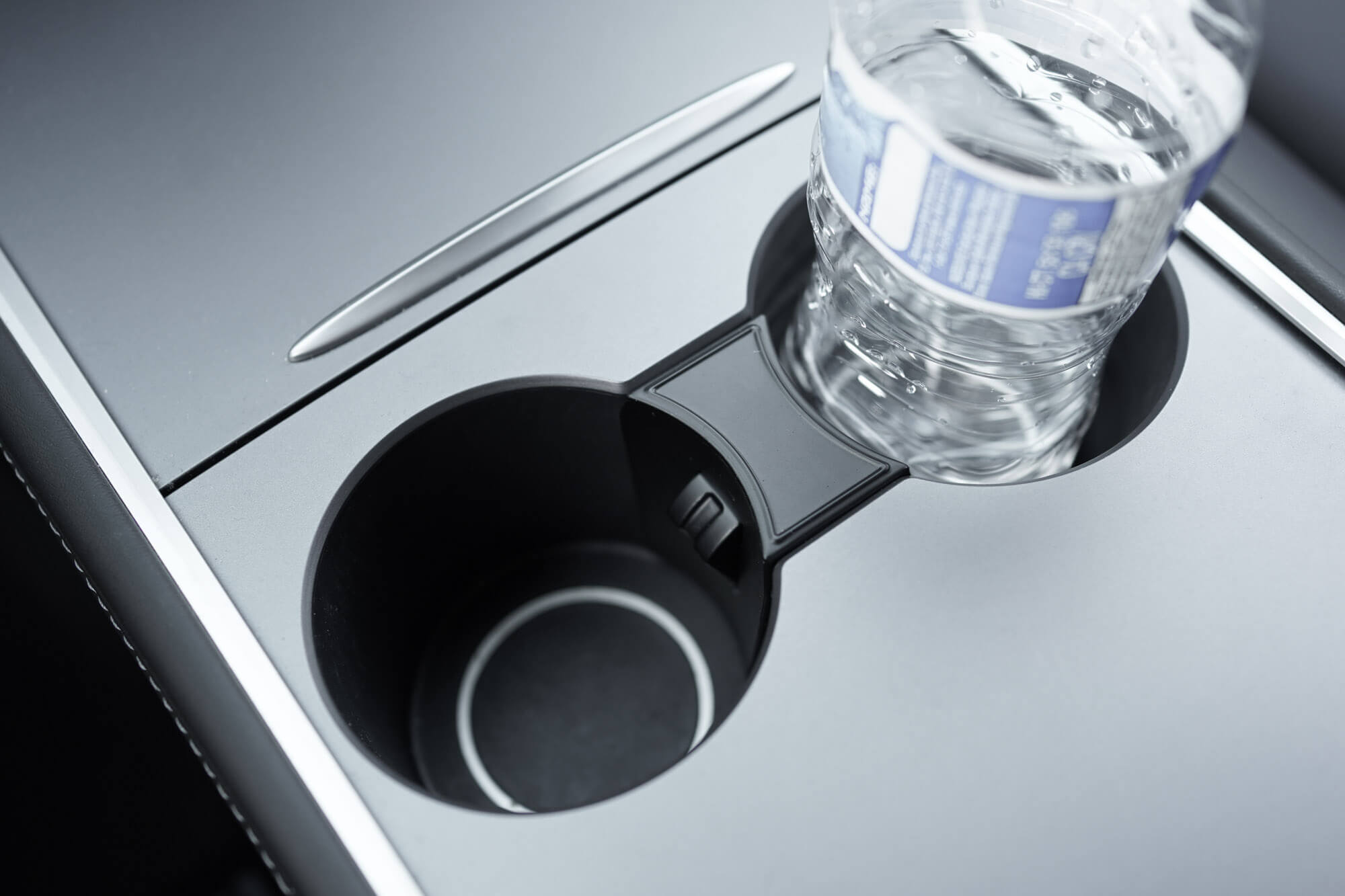 Basenor - spring-loaded cup holder insert